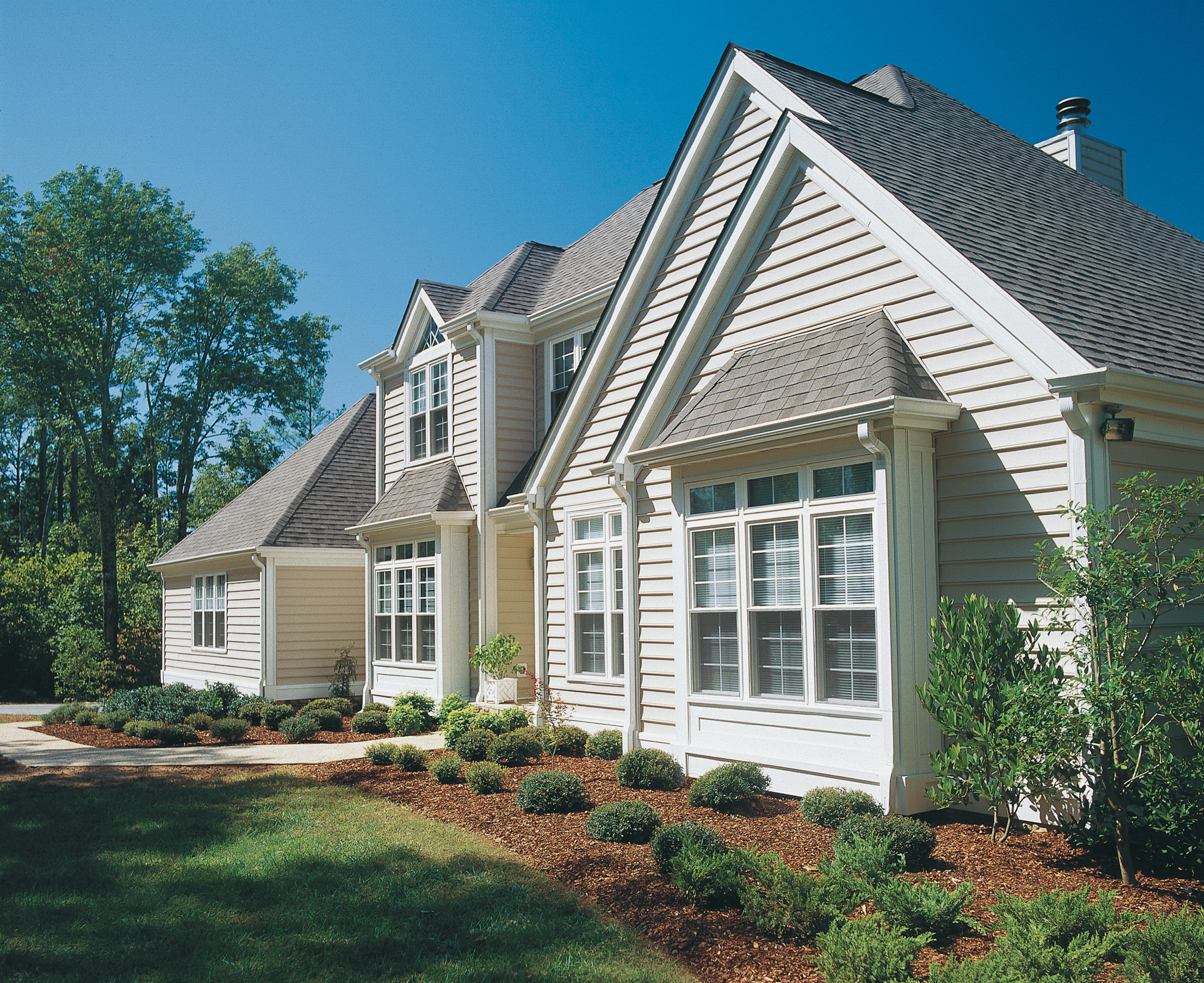ProVia® Cedar Peaks® Vinyl Siding Omaha Door & Window