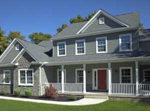 A nice home with gray siding and roofing